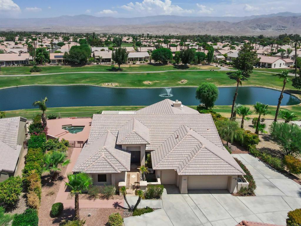 39303 Gleneagles Circle Palm Desert, CA 92211 - Photo 8 of 71 an aerial view of a house with a garden
