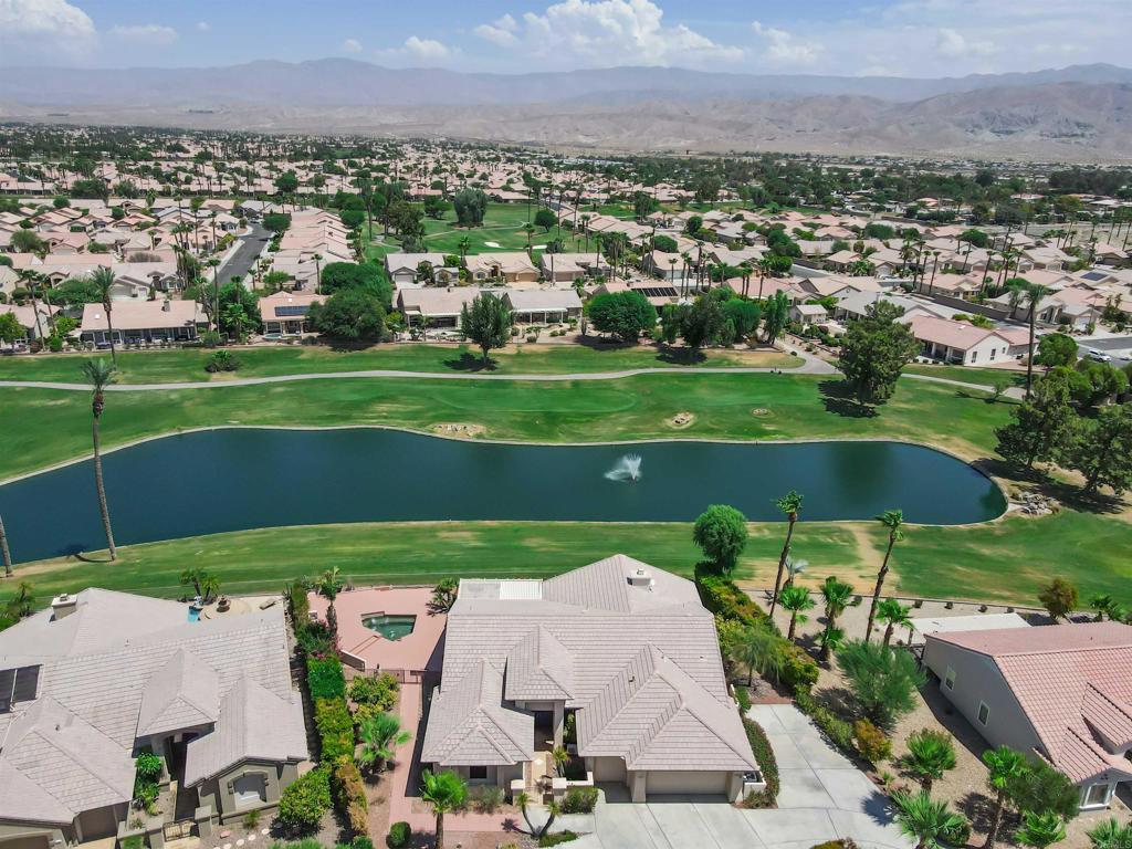 39303 Gleneagles Circle Palm Desert, CA 92211 - Photo 9 of 71 an aerial view of a house with a garden