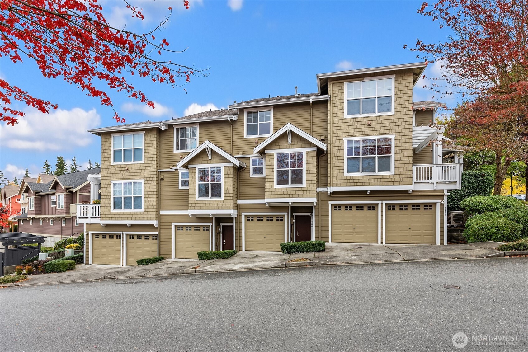 1900 17th Avenue Northeast Issaquah, WA 98029 - Photo 1 of 22 a front view of a house with a yard