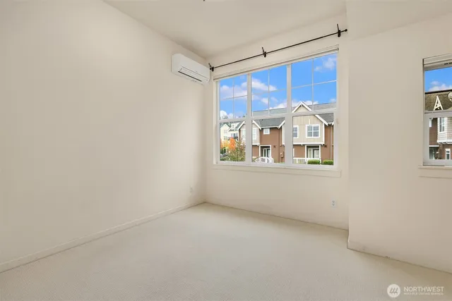 a view of empty room with windows