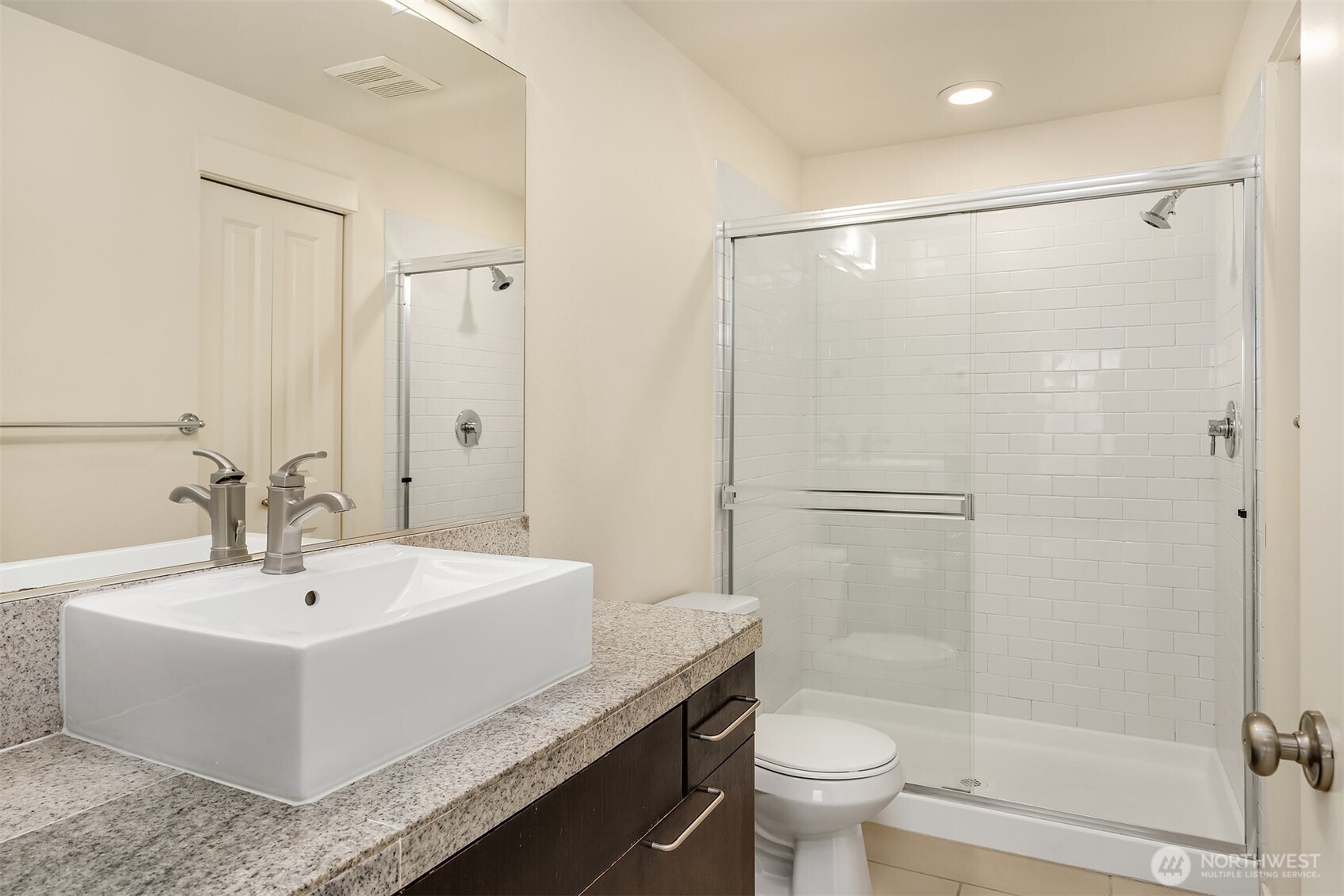 1900 17th Avenue Northeast Issaquah, WA 98029 - Photo 18 of 22 a bathroom with a sink toilet and shower