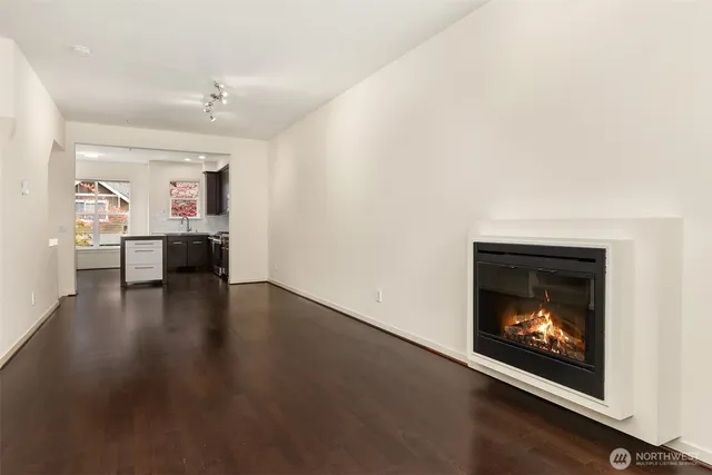 a room with furniture and wooden floor