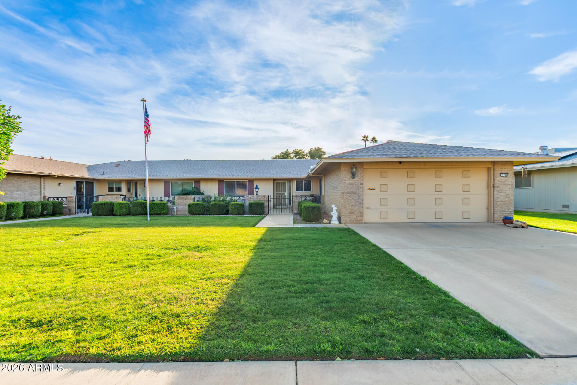 a view of an swimming pool with a yard