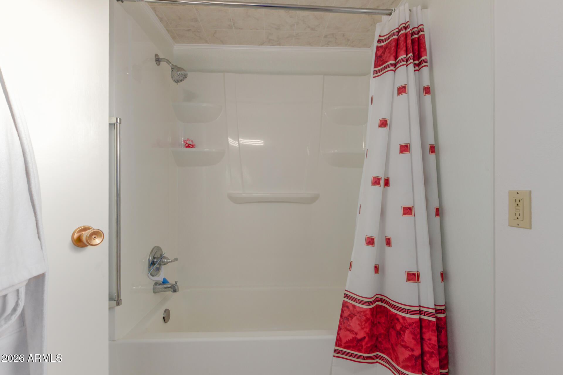 9705 West Oak Ridge Drive Sun City, AZ 85351 - Photo 14 of 23 a bathroom with a bathtub and shower