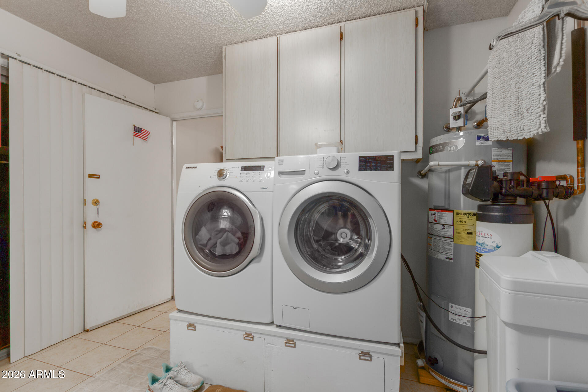 9705 West Oak Ridge Drive Sun City, AZ 85351 - Photo 21 of 23 a utility room with dryer and washer