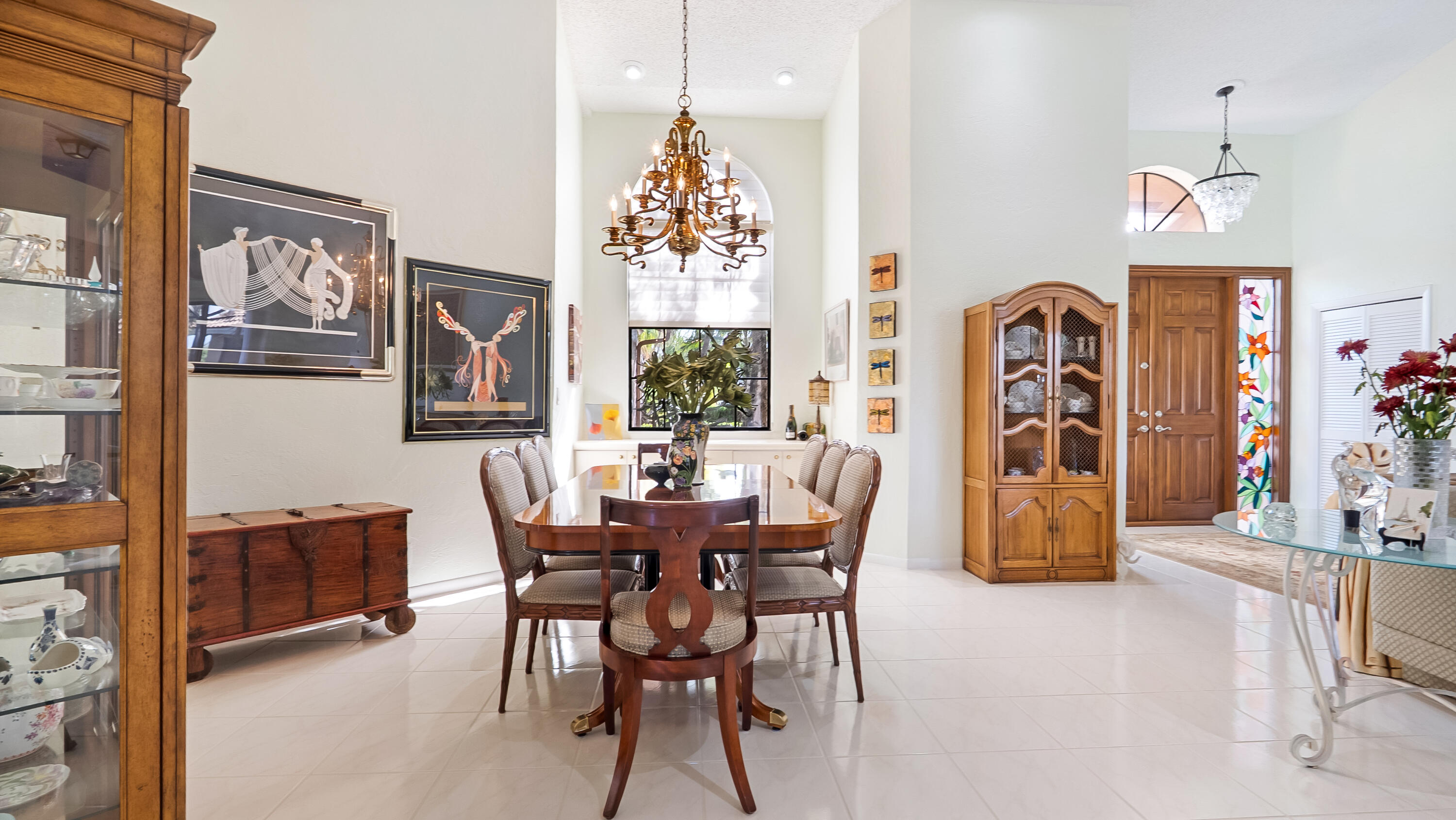 10767 Boca Woods Lane Boca Raton, FL 33428 - Photo 15 of 64 a view of a dining room with furniture window and outside view