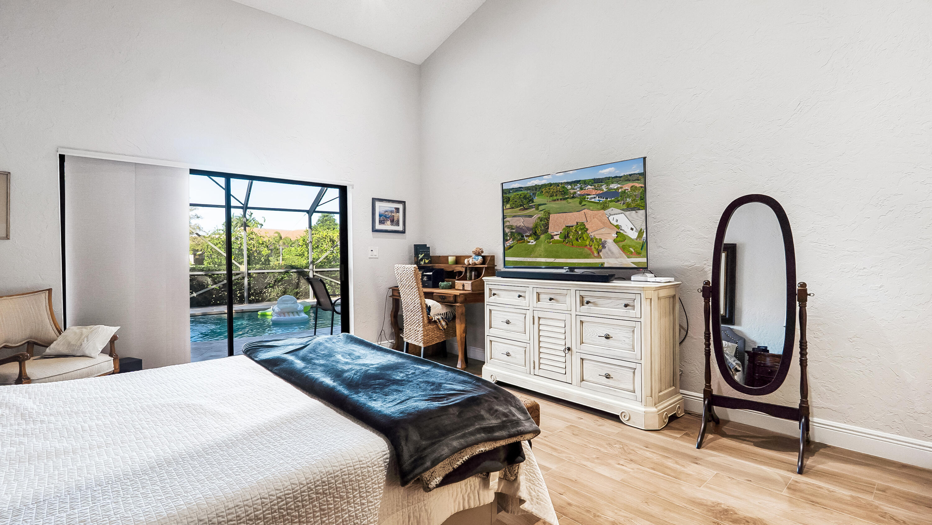 10767 Boca Woods Lane Boca Raton, FL 33428 - Photo 29 of 64 a bedroom with furniture and a window