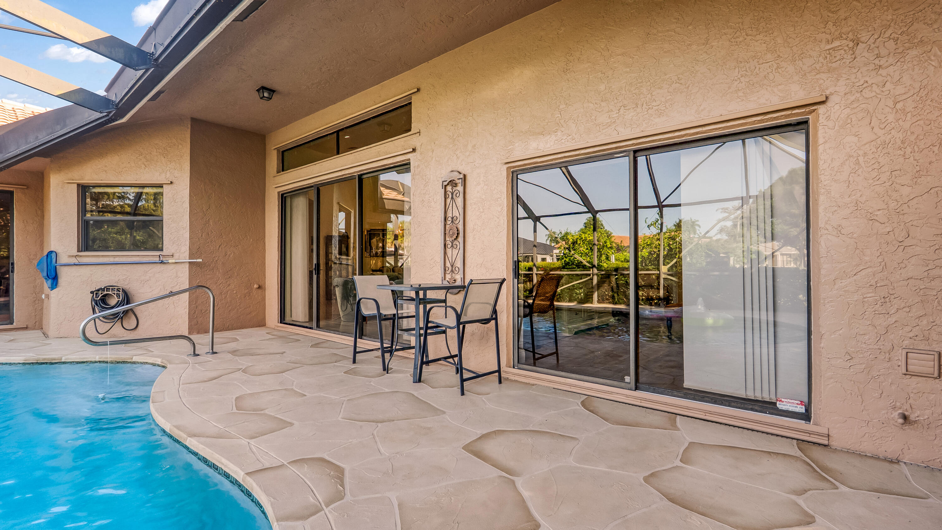 10767 Boca Woods Lane Boca Raton, FL 33428 - Photo 44 of 64 a view of a livingroom with furniture and window