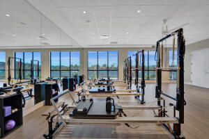 10767 Boca Woods Lane Boca Raton, FL 33428 - Photo 50 of 64 a view of a room with gym equipment