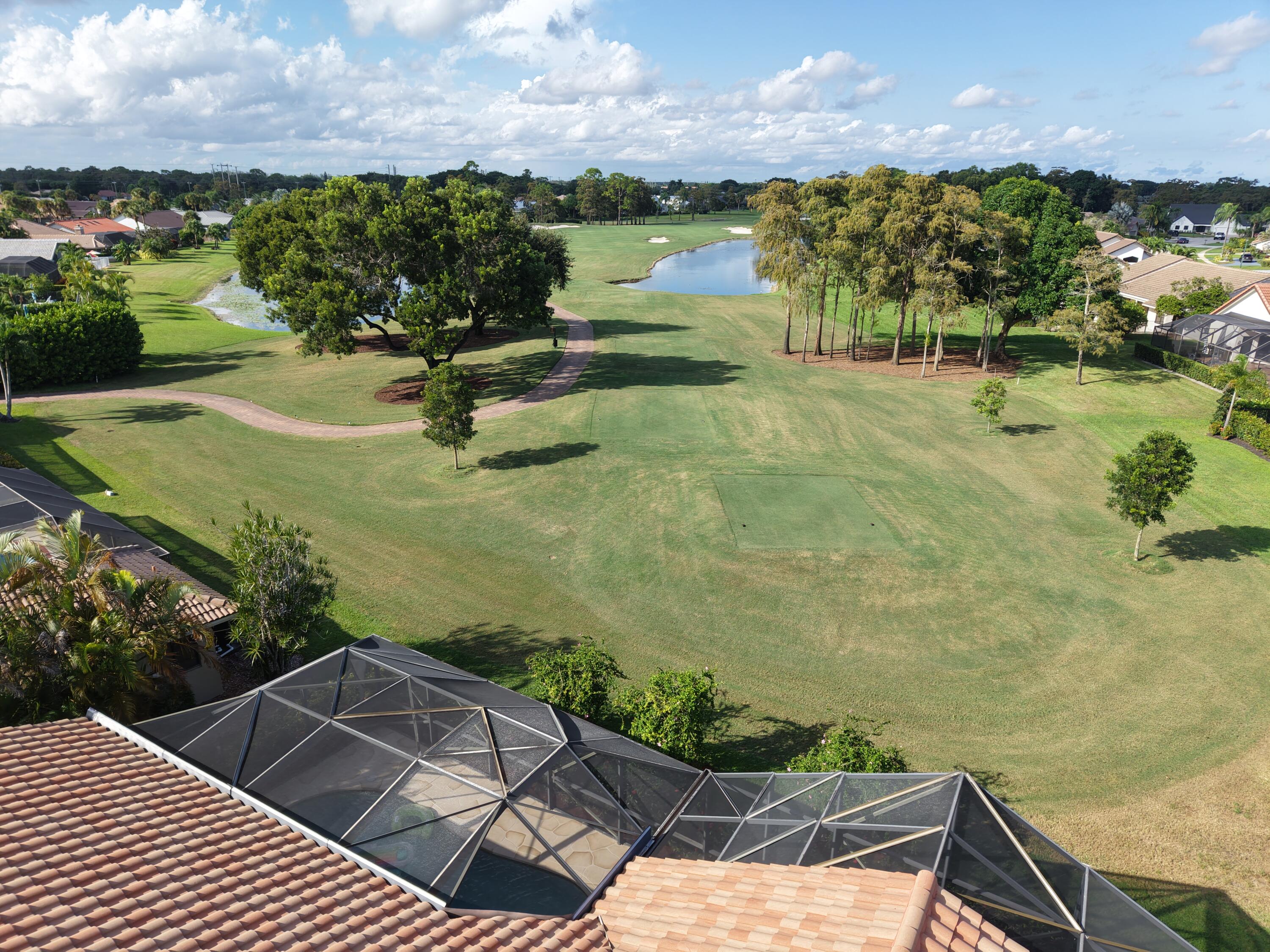 10767 Boca Woods Lane Boca Raton, FL 33428 - Photo 8 of 64 a view of a lake with a outdoor space