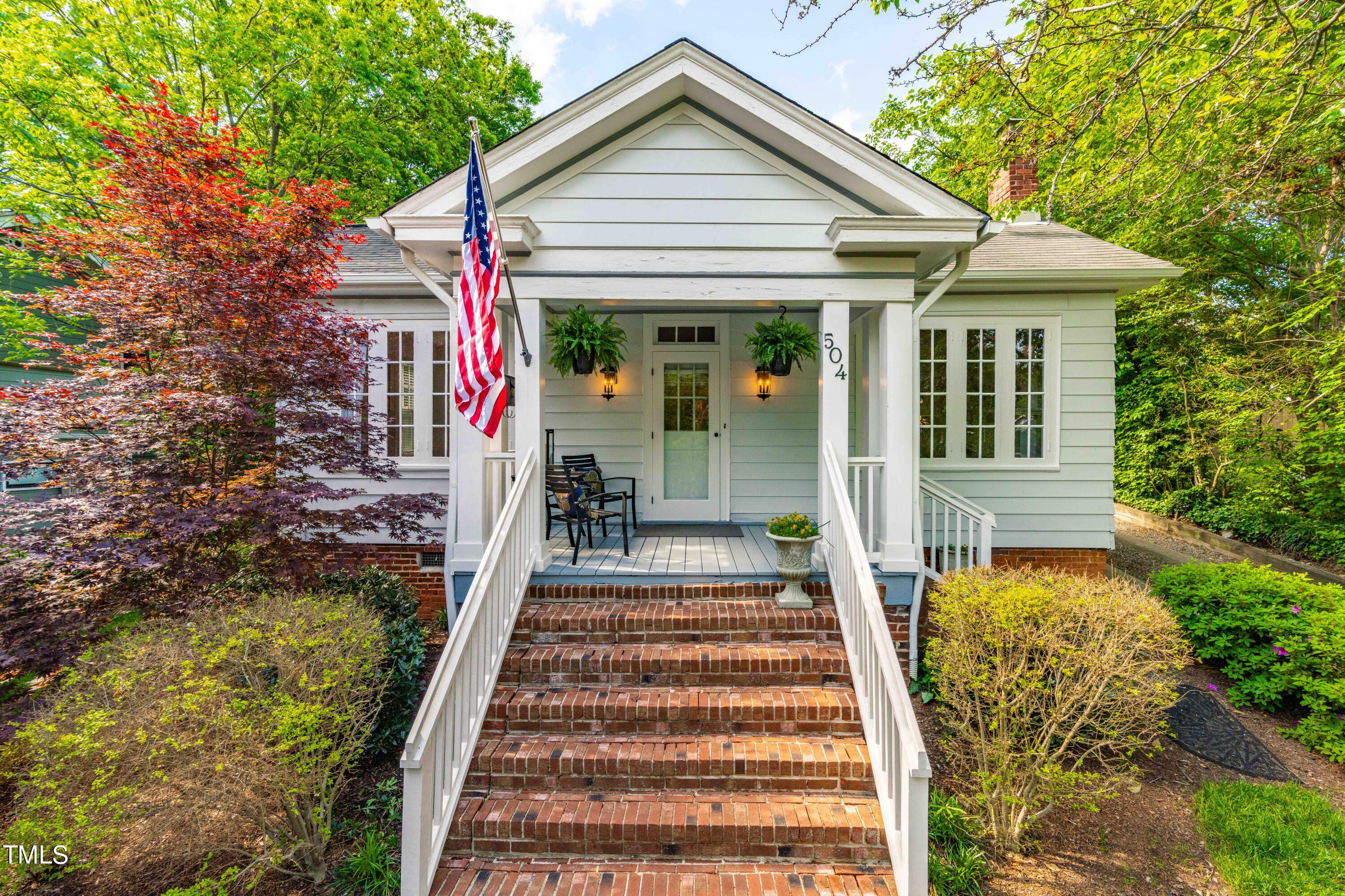 504 Holden Street Raleigh, NC 27604 - Photo 1 of 26 a view of a house with backyard