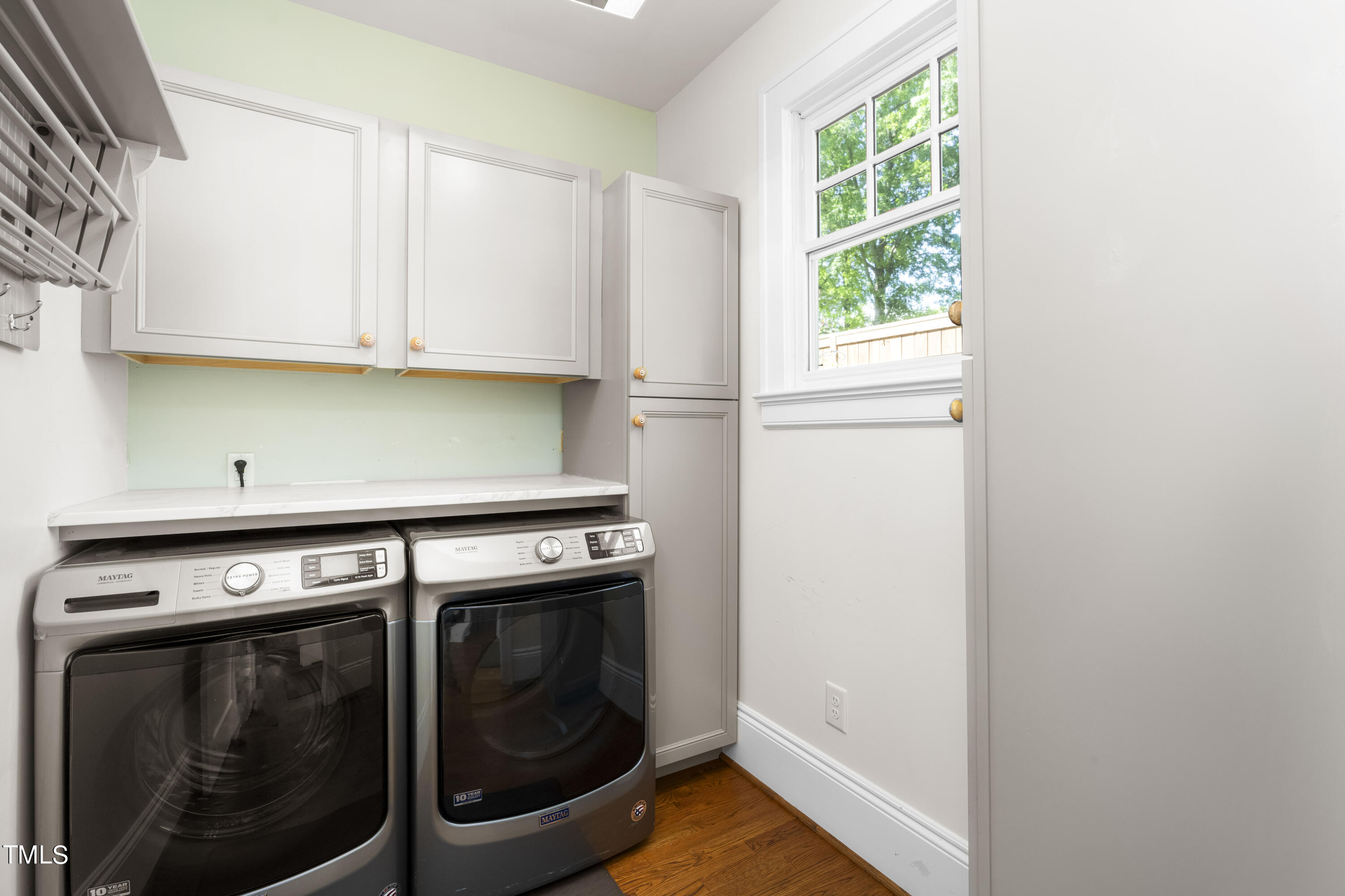 504 Holden Street Raleigh, NC 27604 - Photo 19 of 26 a kitchen with a stove and a microwave