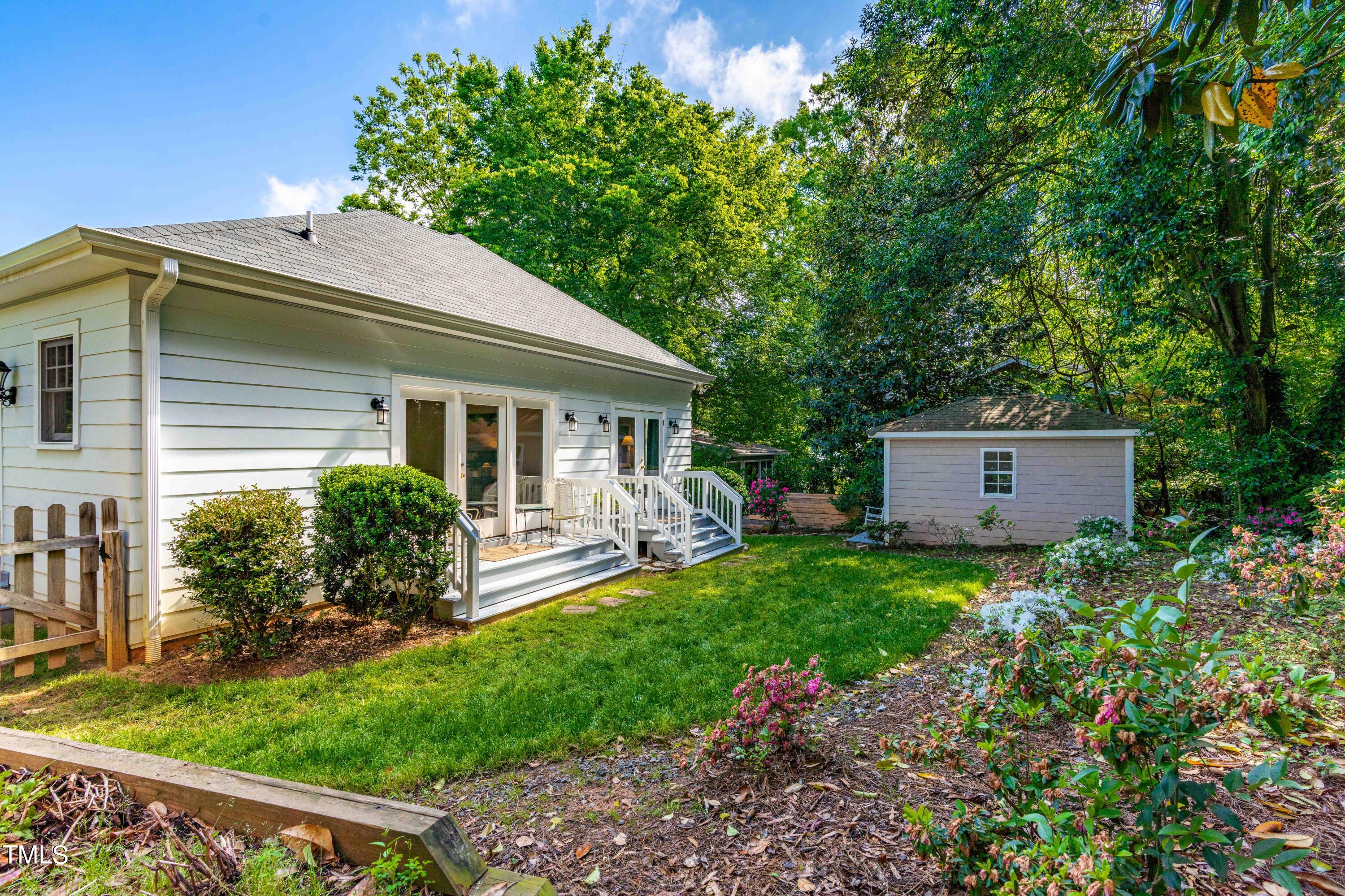 504 Holden Street Raleigh, NC 27604 - Photo 24 of 26 a house view with a garden space