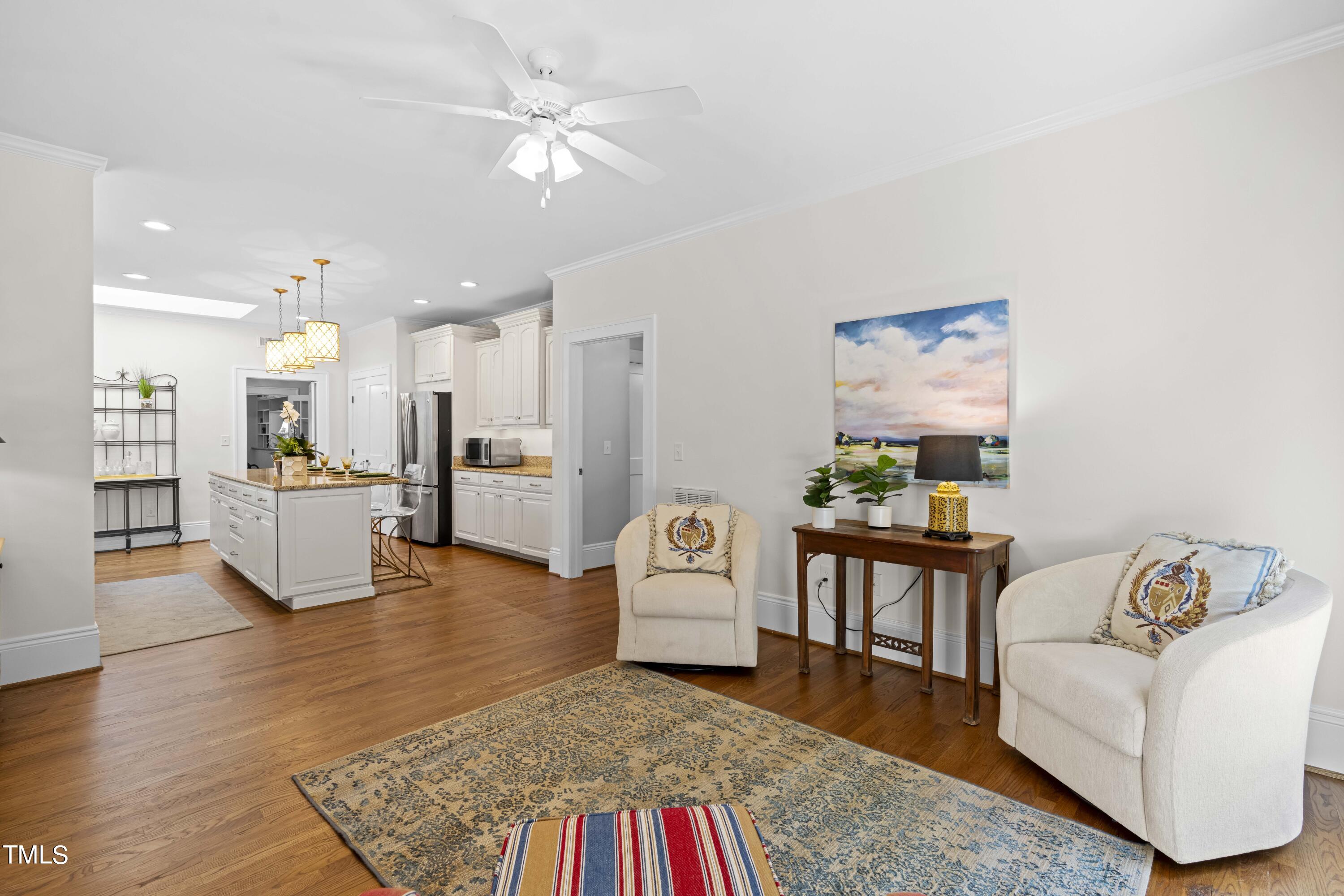 504 Holden Street Raleigh, NC 27604 - Photo 10 of 26 a living room with furniture and kitchen view
