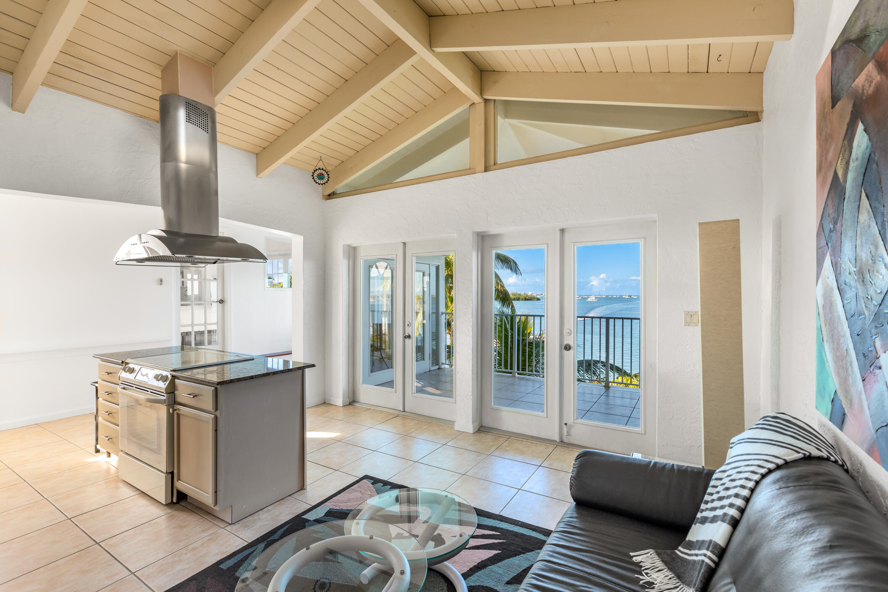 32 Hilton Haven Road, Unit 6 Key West, FL 33040 - Photo 13 of 26 a living room with furniture and view of kitchen
