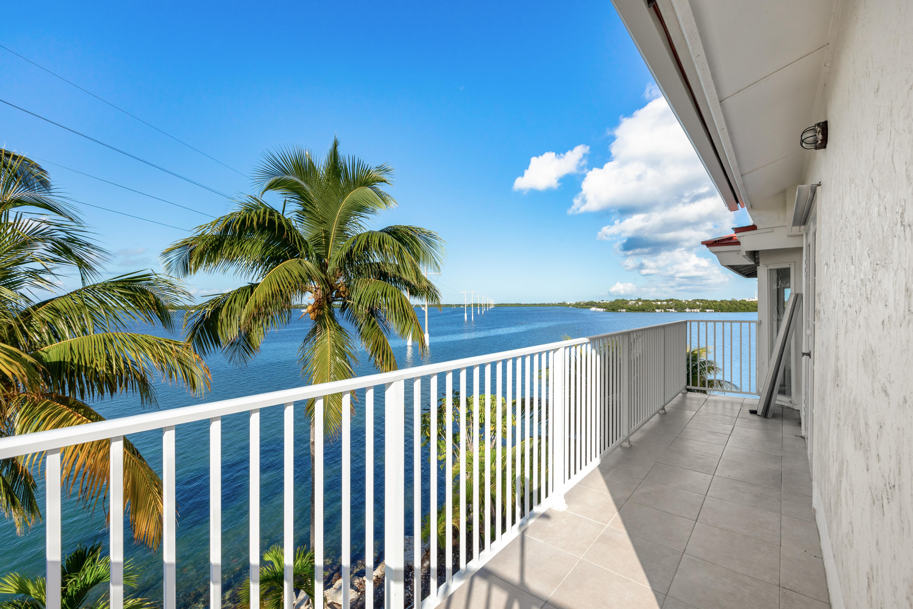 32 Hilton Haven Road, Unit 6 Key West, FL 33040 - Photo 17 of 26 a view of a balcony with a potted plant