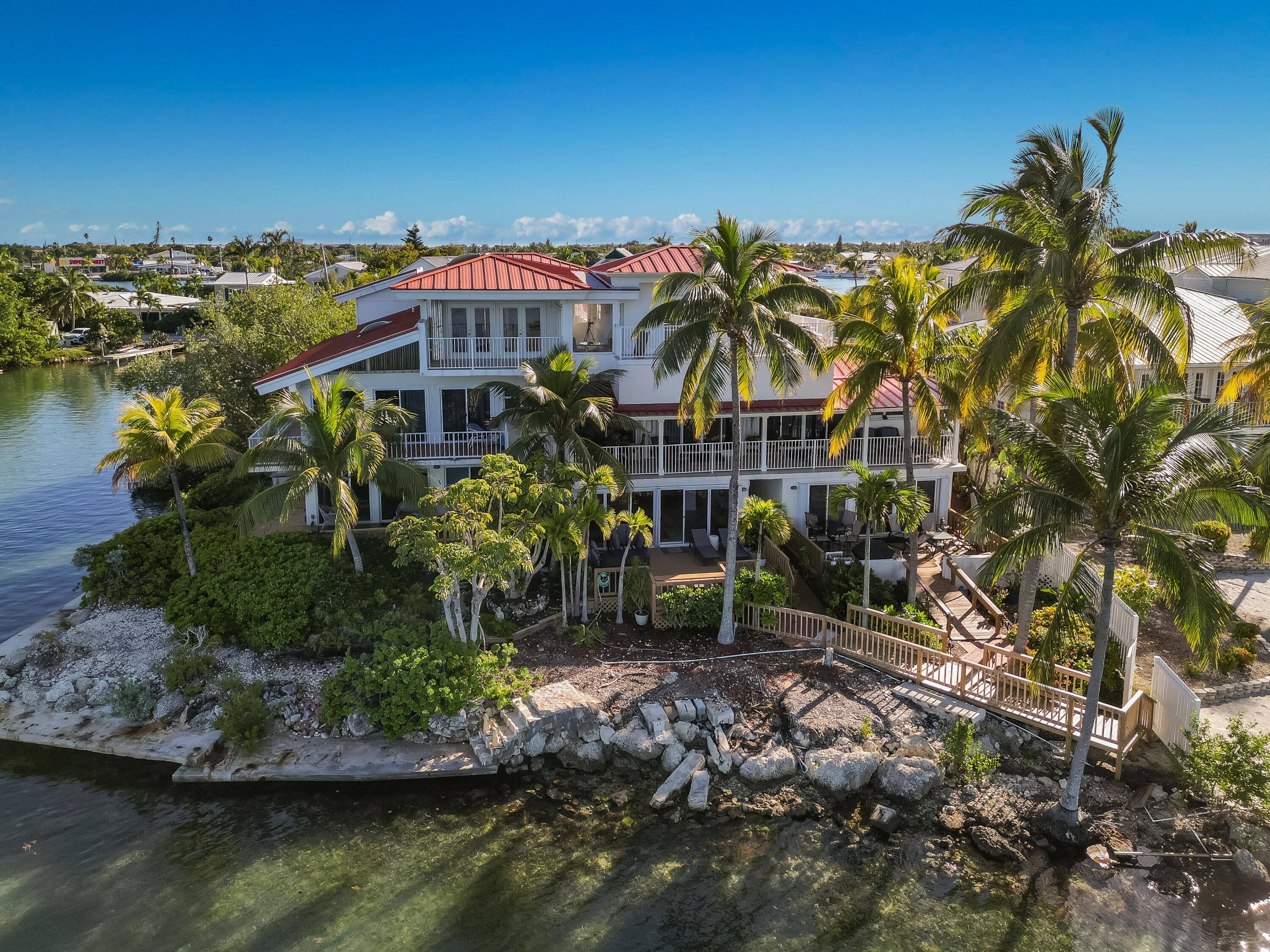 32 Hilton Haven Road, Unit 6 Key West, FL 33040 - Photo 22 of 26 a view of a swimming pool with a patio