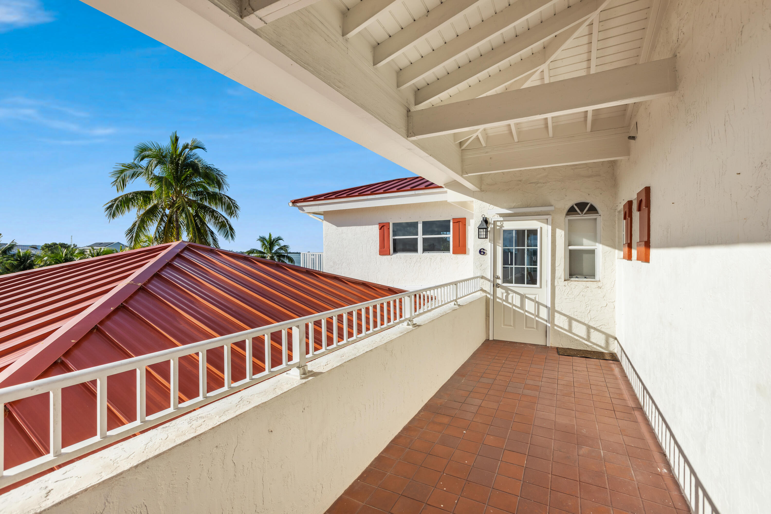 32 Hilton Haven Road, Unit 6 Key West, FL 33040 - Photo 5 of 26 a view of a house with a balcony