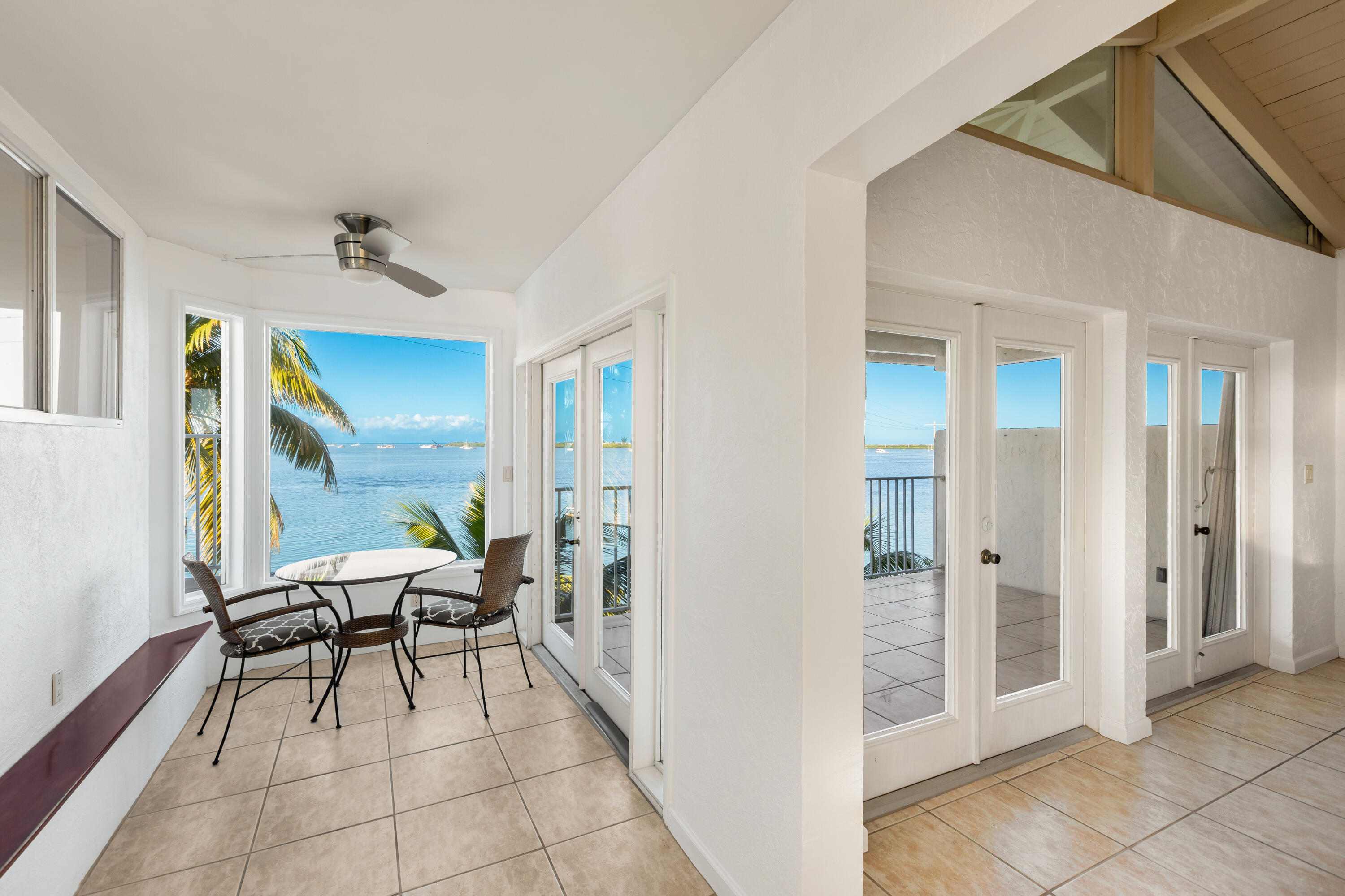 32 Hilton Haven Road, Unit 6 Key West, FL 33040 - Photo 7 of 26 a view of a hallway with furniture and front door