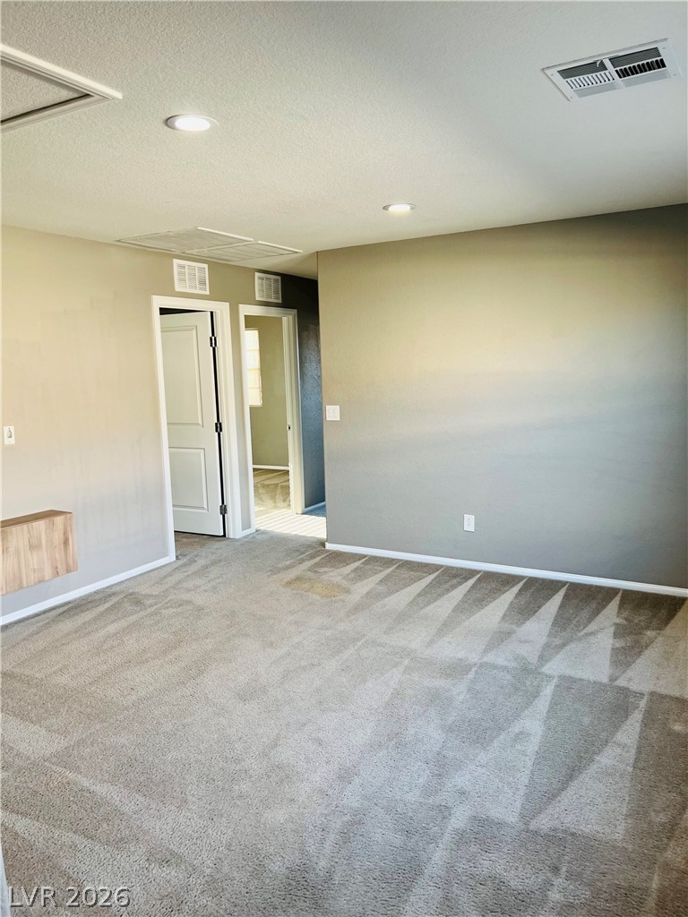 9325 Keystone Ridge Avenue Las Vegas, NV 89148 - Photo 10 of 17 A well-lit room with fresh carpeting awaits your personal touch and design.