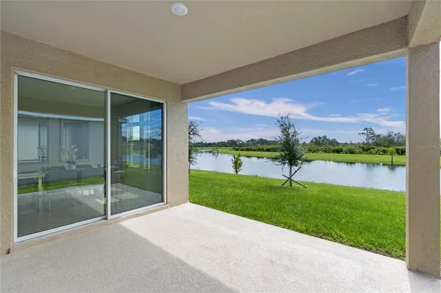 a aerial view of a house with a big yard