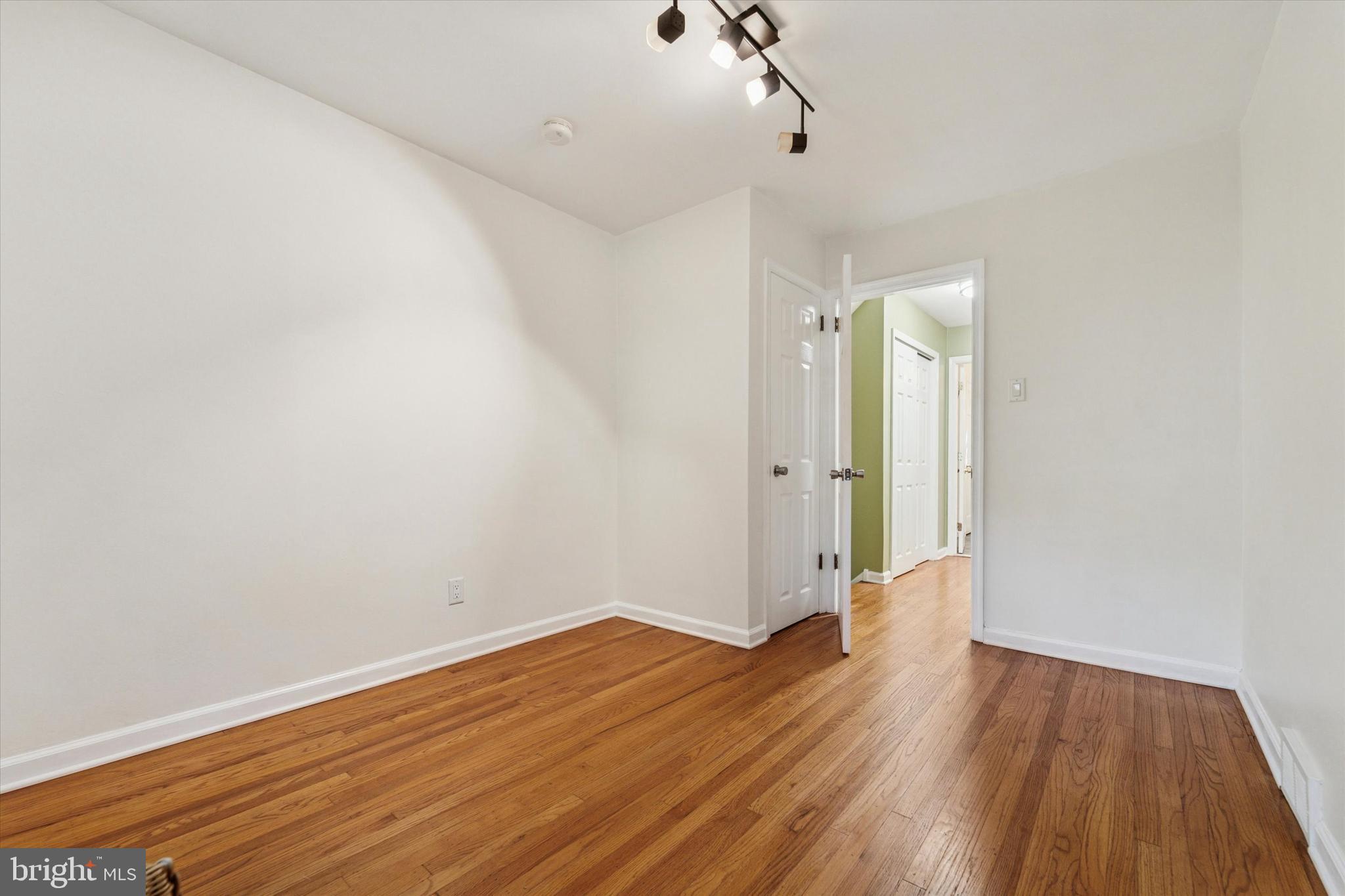 679 Crestwood Road Wayne, PA 19087 - Photo 11 of 19 a view of a room with wooden floor and white walls