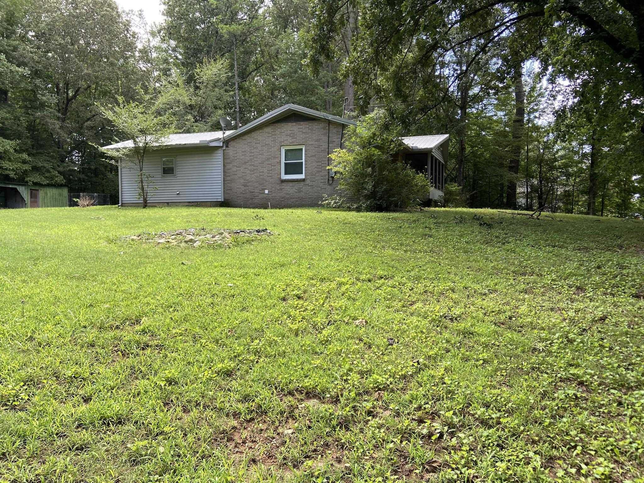 639 Beacon Road Parsons, TN 38363 - Photo 21 of 26 a view of a house with a yard