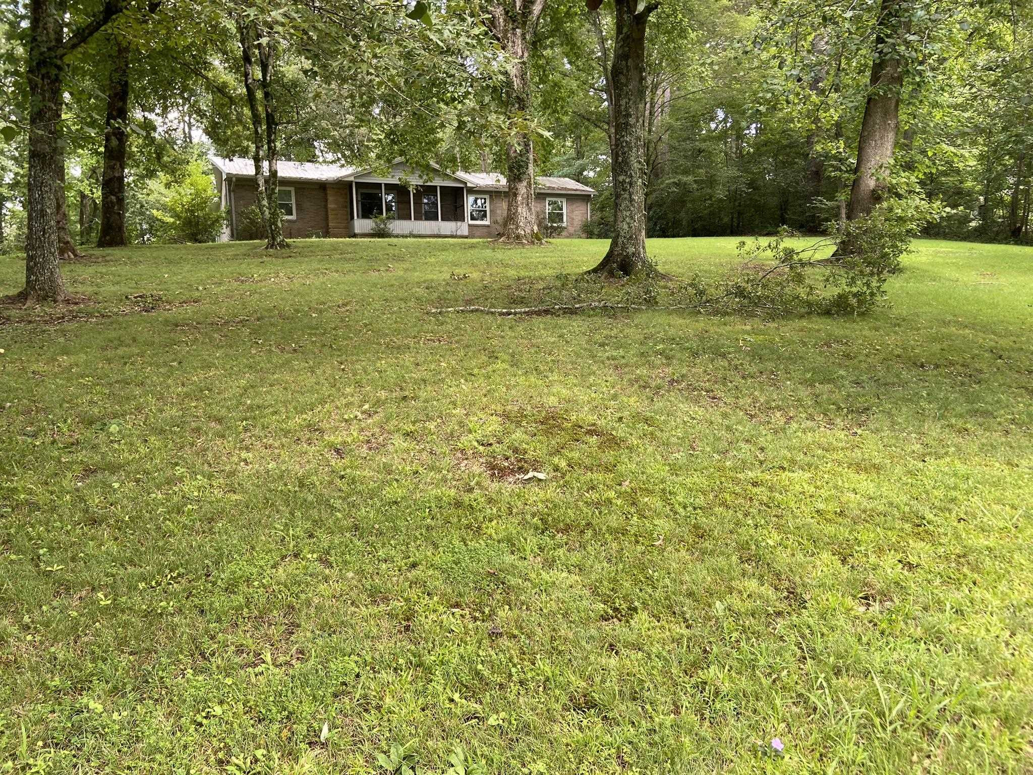 639 Beacon Road Parsons, TN 38363 - Photo 24 of 26 a view of a house with a big yard