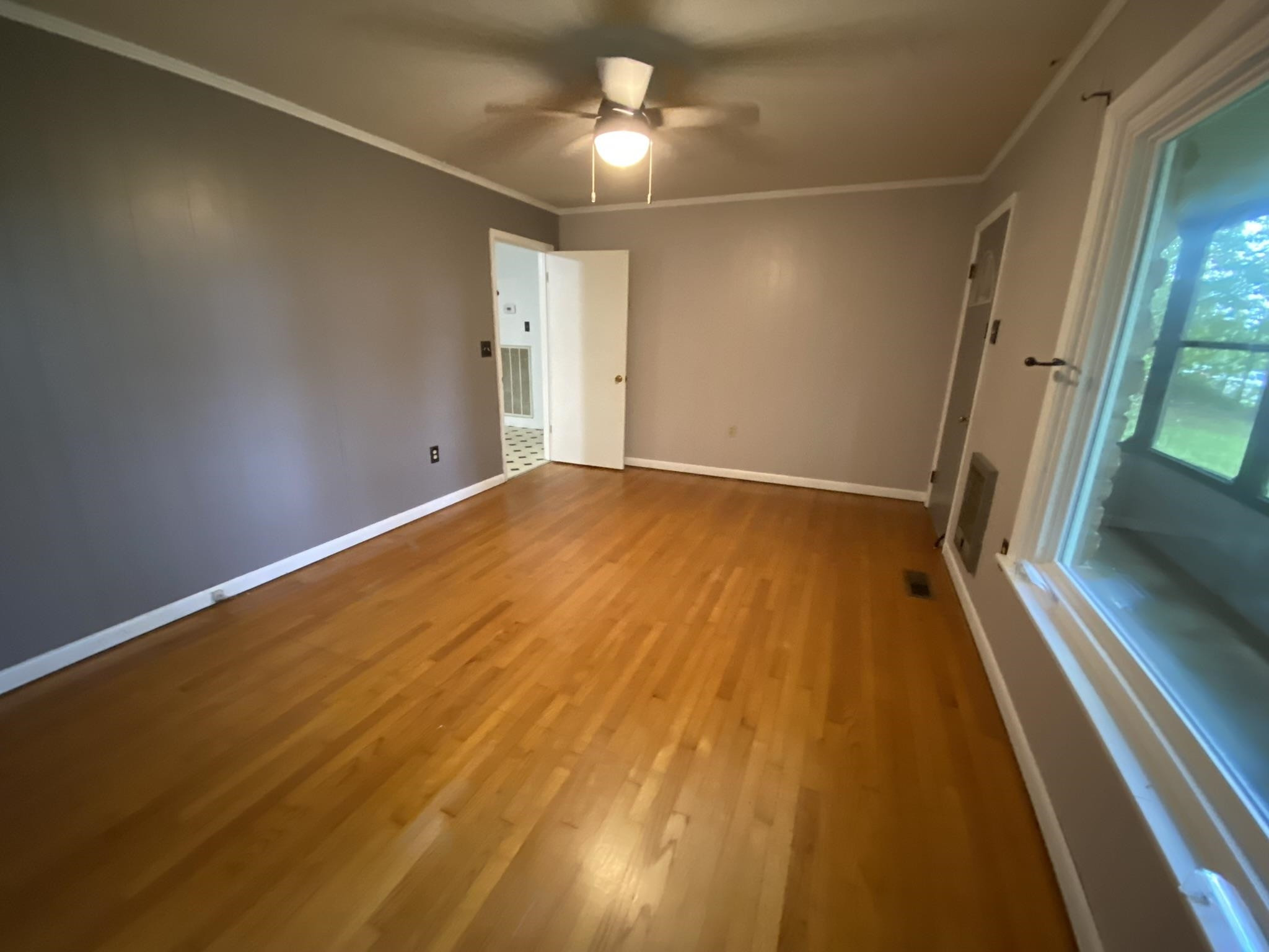 639 Beacon Road Parsons, TN 38363 - Photo 7 of 26 a view of empty room with wooden floor