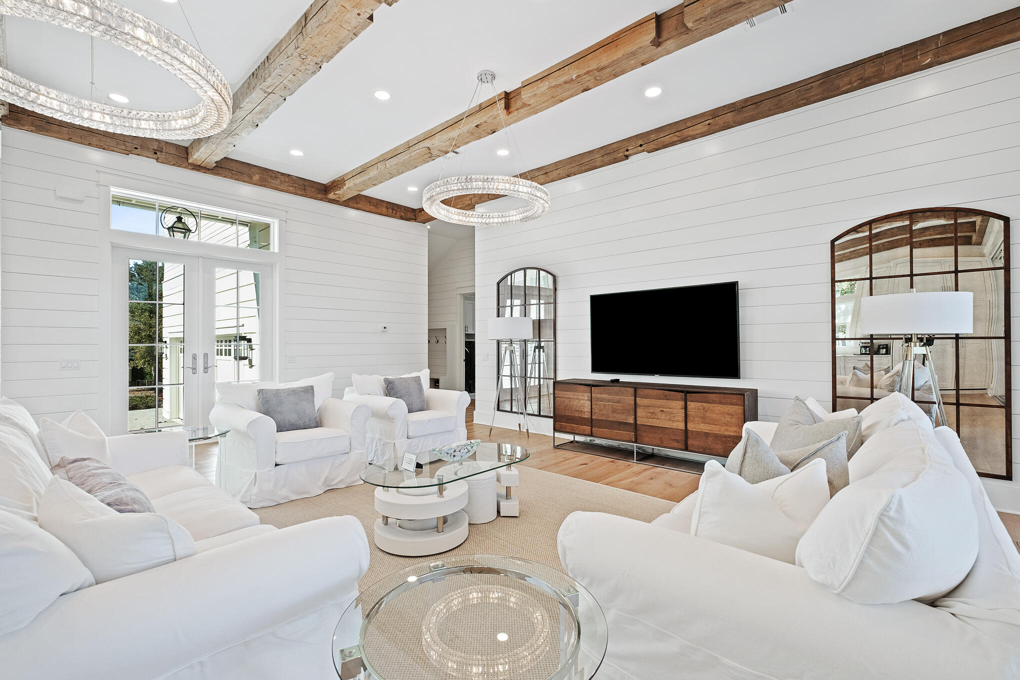 27 Sand Dunes Road Santa Rosa Beach, FL 32459 - Photo 11 of 74 a living room with furniture and a flat screen tv