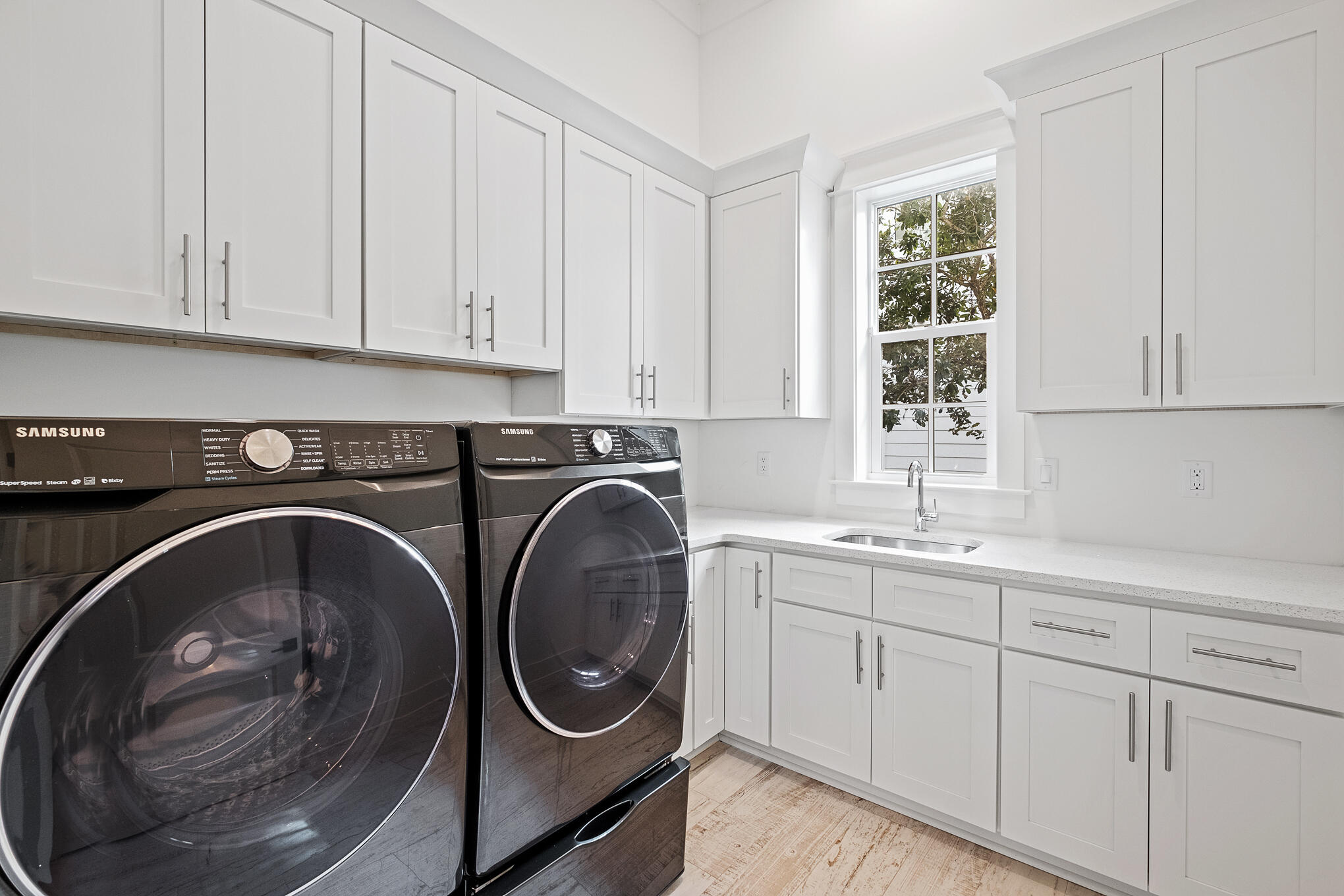 27 Sand Dunes Road Santa Rosa Beach, FL 32459 - Photo 18 of 74 a utility room with sink dryer and washer