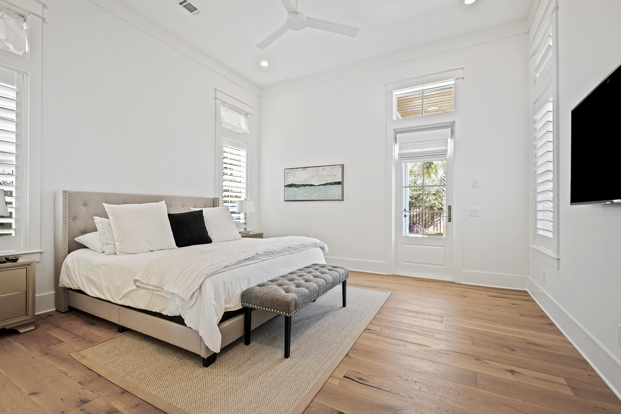 27 Sand Dunes Road Santa Rosa Beach, FL 32459 - Photo 21 of 74 a bedroom with a bed lamp on desk and a window