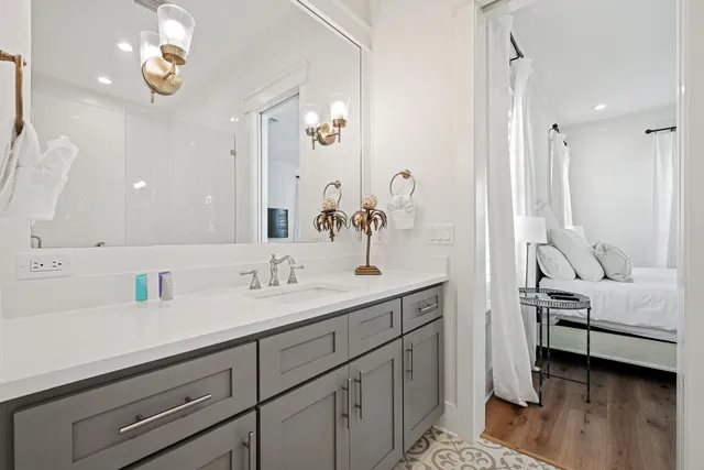 a large kitchen with a table and chairs