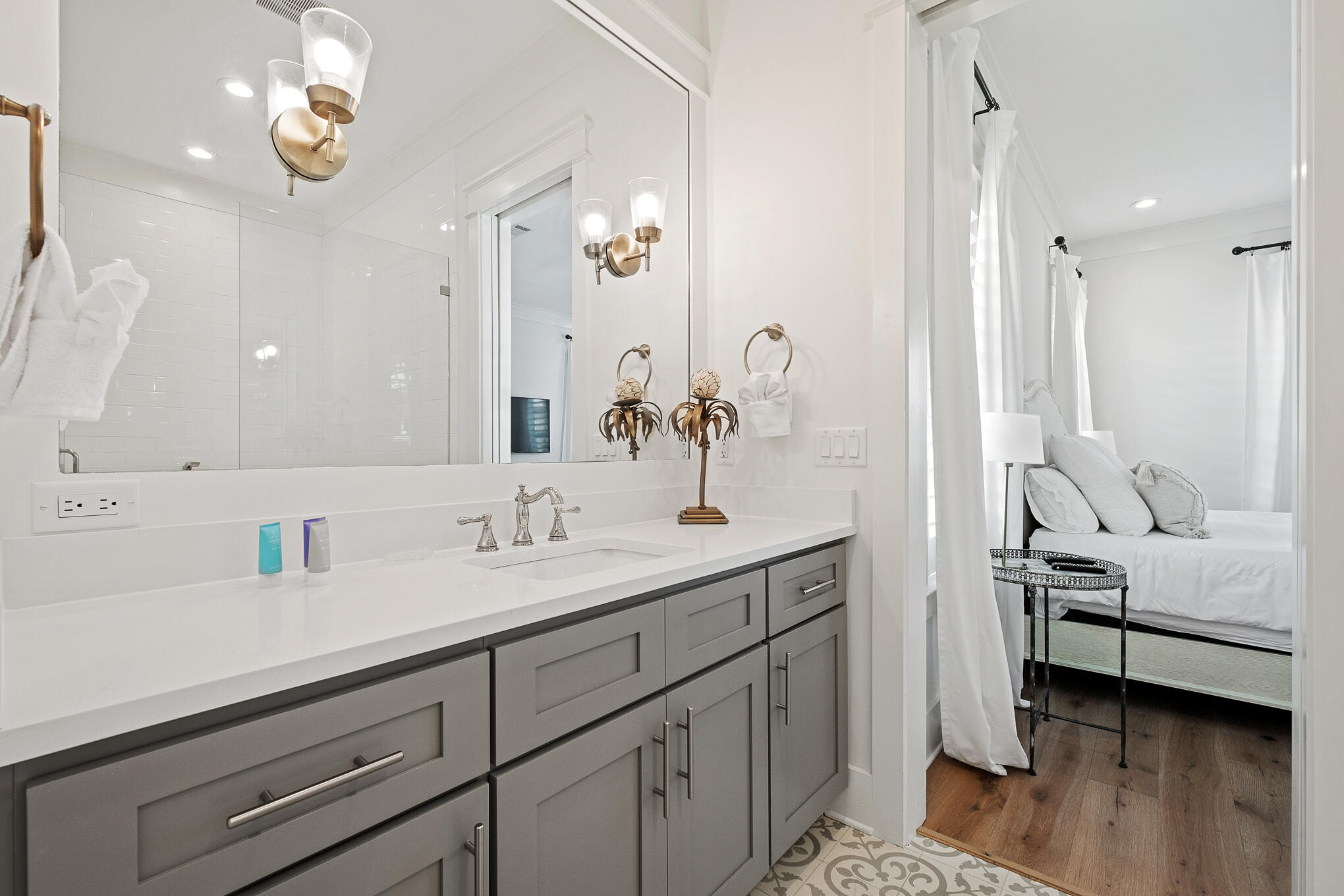 27 Sand Dunes Road Santa Rosa Beach, FL 32459 - Photo 30 of 74 a bathroom with a double vanity sink a mirror and a bathtub