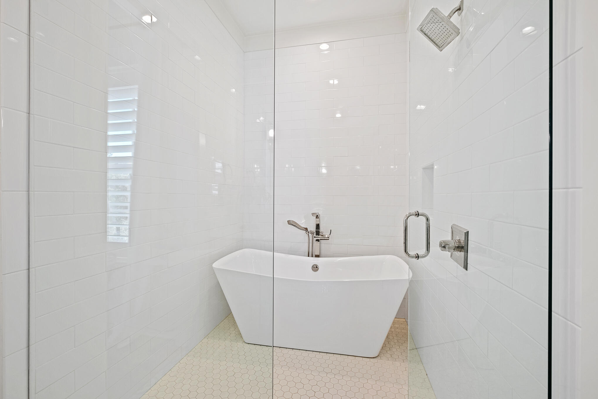 27 Sand Dunes Road Santa Rosa Beach, FL 32459 - Photo 31 of 74 a bathroom with a white tub sitting next to a sink