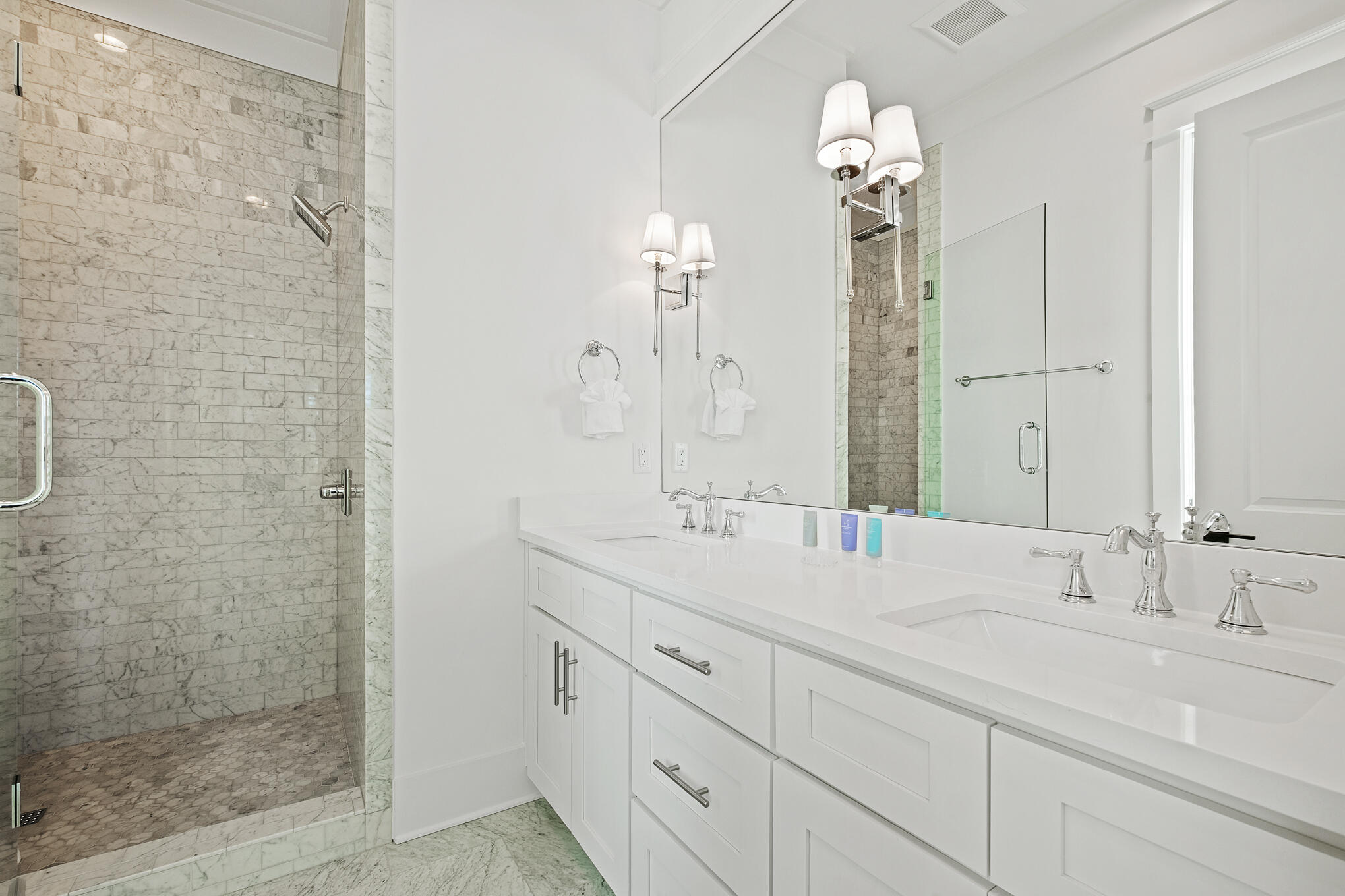 27 Sand Dunes Road Santa Rosa Beach, FL 32459 - Photo 35 of 74 a bathroom with a double vanity sink mirror and shower