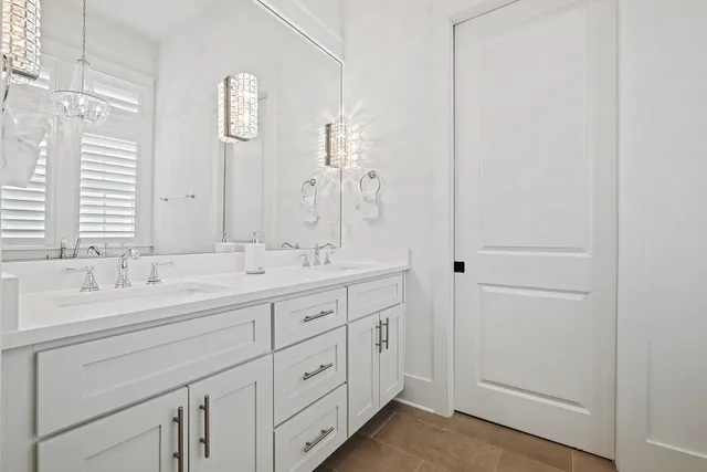 a living room with furniture large window and flat screen tv