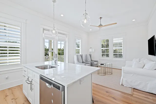 a view of a patio with swimming pool table and chairs