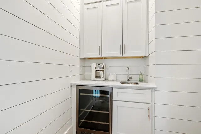 an aerial view of a house with a garden