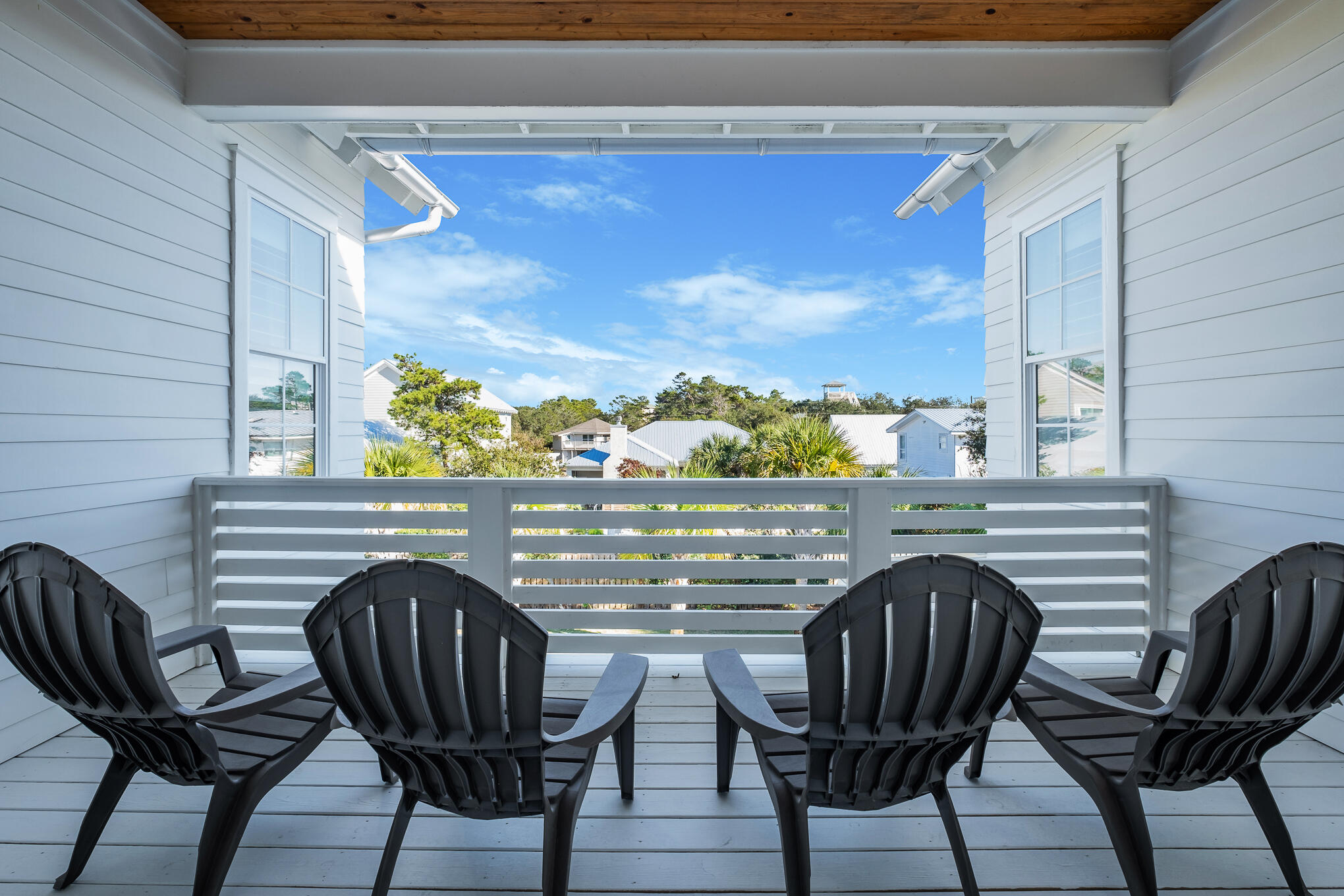 27 Sand Dunes Road Santa Rosa Beach, FL 32459 - Photo 56 of 74 a view of a chairs and table in the balcony