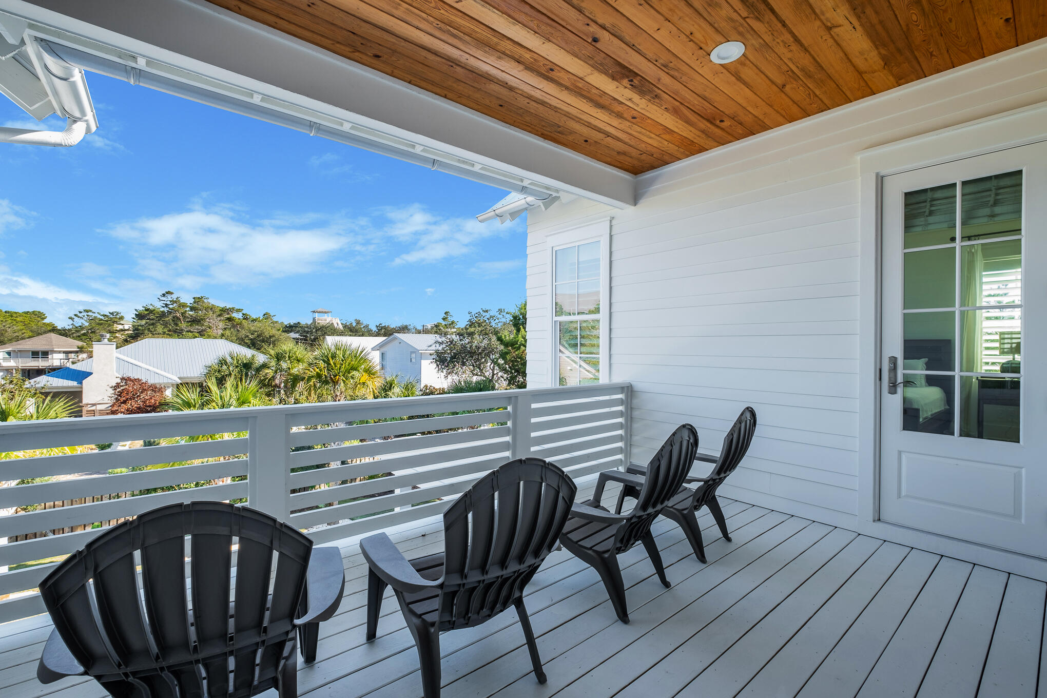 27 Sand Dunes Road Santa Rosa Beach, FL 32459 - Photo 57 of 74 a view of a chairs and table in the balcony