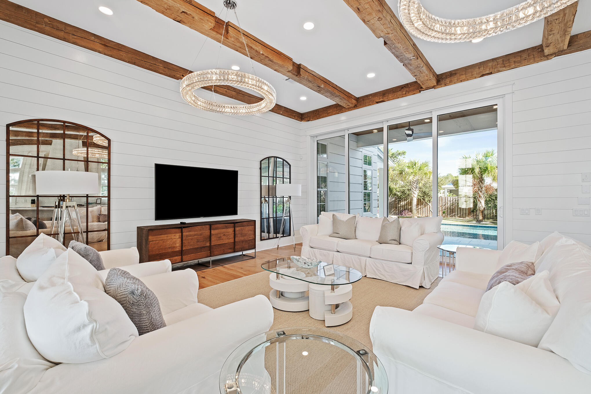 27 Sand Dunes Road Santa Rosa Beach, FL 32459 - Photo 9 of 74 a living room with furniture and a flat screen tv