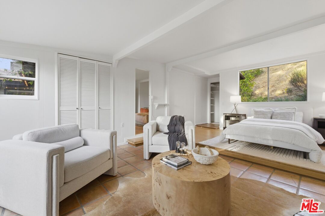 3100 Santa Maria Road Topanga, CA 90290 - Photo 17 of 66 a living room with furniture and window