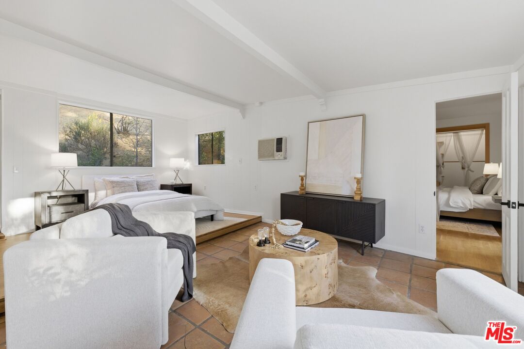 3100 Santa Maria Road Topanga, CA 90290 - Photo 18 of 66 a living room with furniture and window