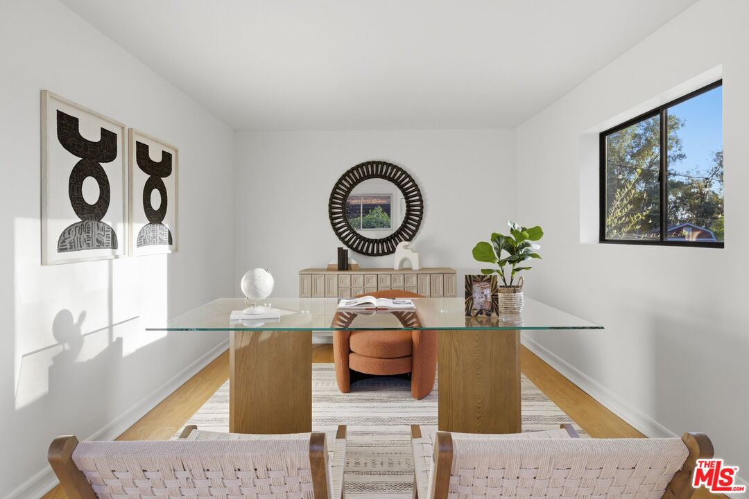 3100 Santa Maria Road Topanga, CA 90290 - Photo 21 of 66 a living room with furniture and a mirror