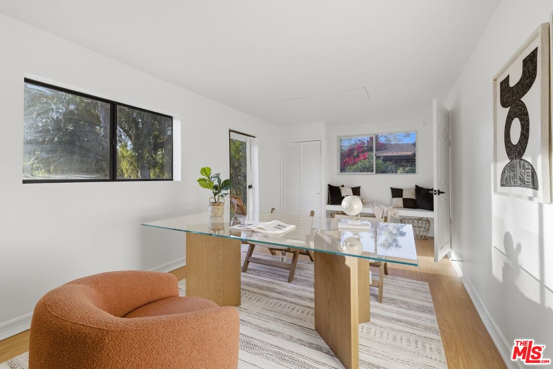 3100 Santa Maria Road Topanga, CA 90290 - Photo 22 of 66 a living room with furniture and wooden floor