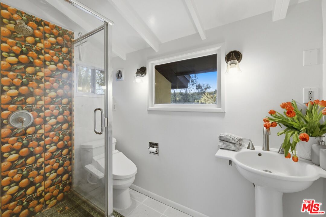 3100 Santa Maria Road Topanga, CA 90290 - Photo 24 of 66 a bathroom with a sink toilet and shower