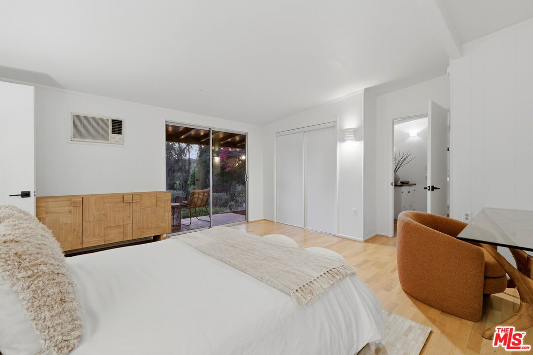 3100 Santa Maria Road Topanga, CA 90290 - Photo 26 of 66 a bedroom with a bed and a couch