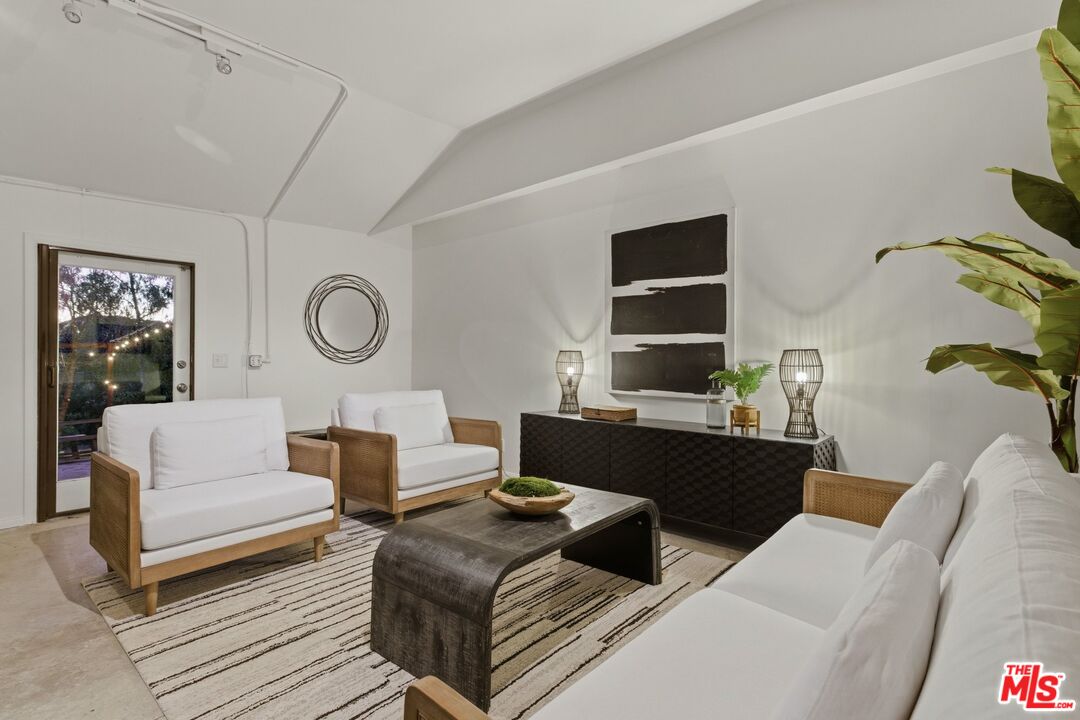 3100 Santa Maria Road Topanga, CA 90290 - Photo 36 of 66 a living room with furniture and wooden floor