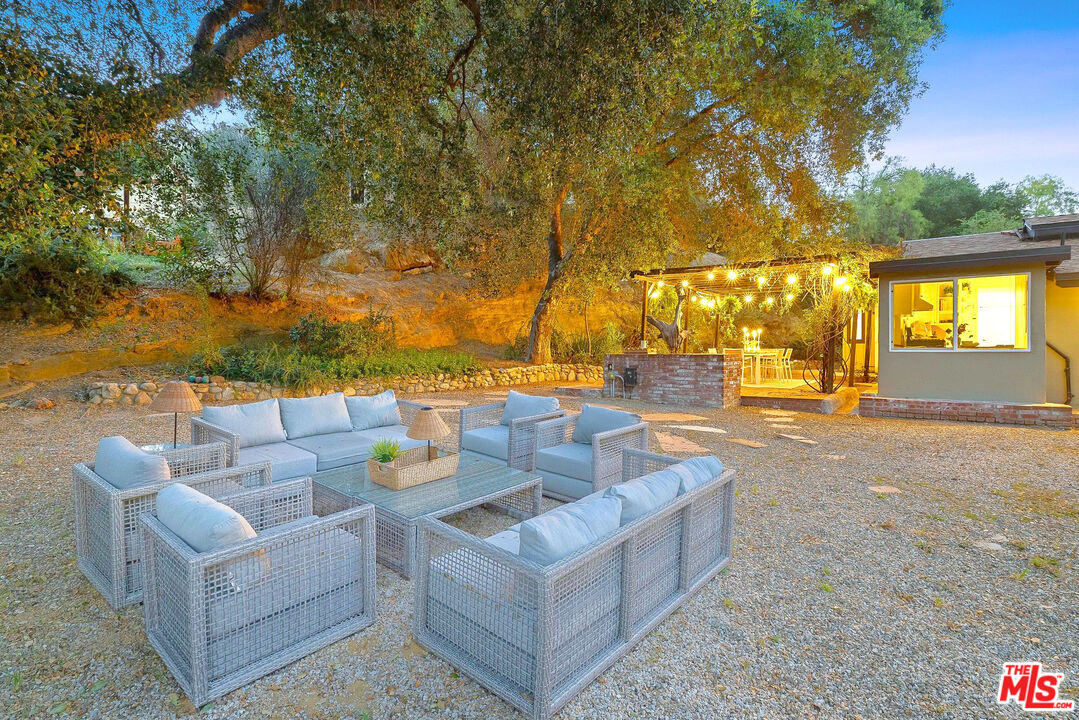 3100 Santa Maria Road Topanga, CA 90290 - Photo 46 of 66 swimming pool with outdoor seating and yard